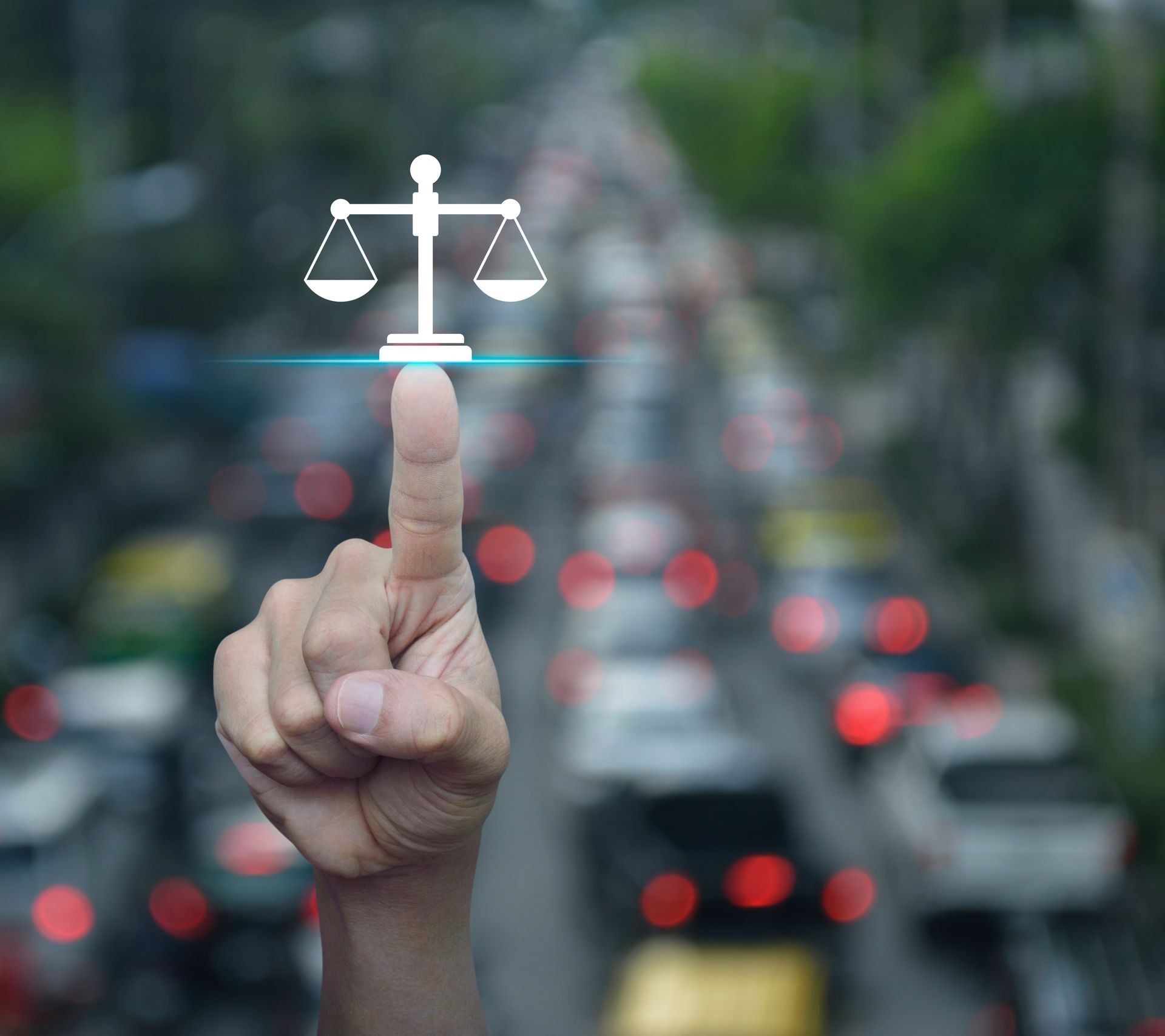 Businessman pressing law flat icon over blur of rush hour with cars and road in city, Business legal service concept